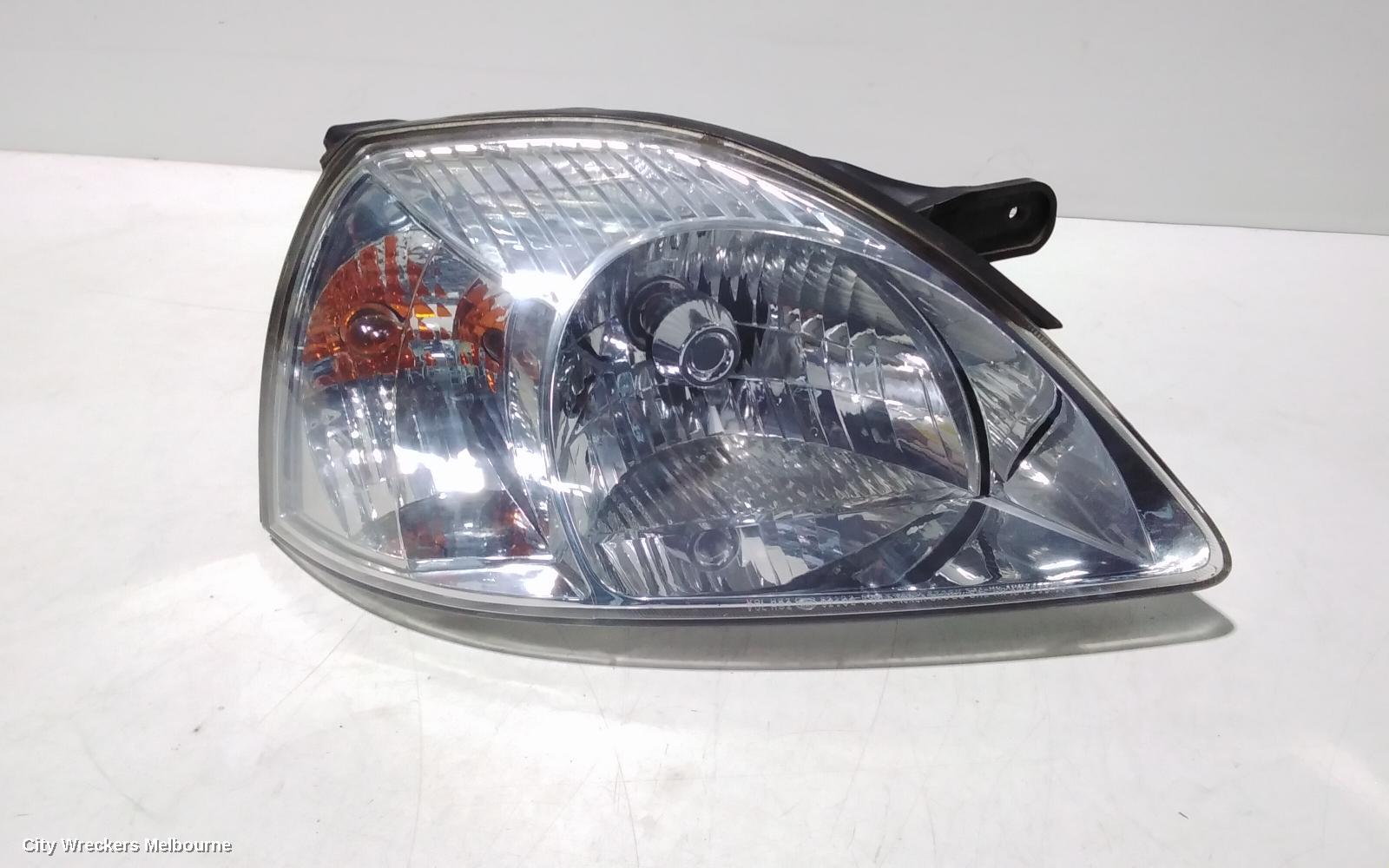 KIA RIO RIGHT HEADLAMP, DC, ORANGE BULB TYPE, 09/2002 - 07/2005
