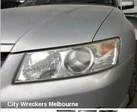 HOLDEN COMMODORE RIGHT HEADLAMP, VZ, ADVENTRA/BERLINA, PROJECTOR TYPE (CHROME), 08/2004 - 09/2007