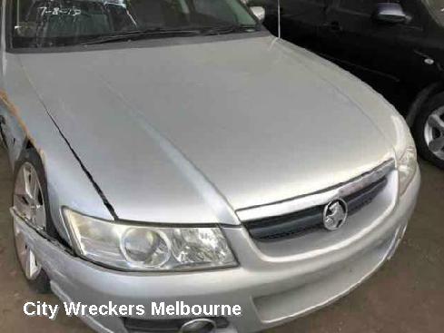 HOLDEN COMMODORE RIGHT HEADLAMP, VZ, ADVENTRA/BERLINA, PROJECTOR TYPE (CHROME), 08/2004 - 09/2007