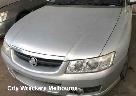 HOLDEN COMMODORE RIGHT HEADLAMP, VZ, ADVENTRA/BERLINA, PROJECTOR TYPE (CHROME), 08/2004 - 09/2007