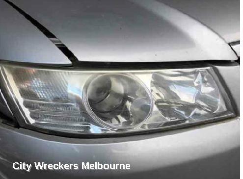 HOLDEN COMMODORE RIGHT HEADLAMP, VZ, ADVENTRA/BERLINA, PROJECTOR TYPE (CHROME), 08/2004 - 09/2007