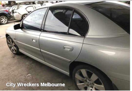 HOLDEN COMMODORE RIGHT HEADLAMP, VZ, ADVENTRA/BERLINA, PROJECTOR TYPE (CHROME), 08/2004 - 09/2007