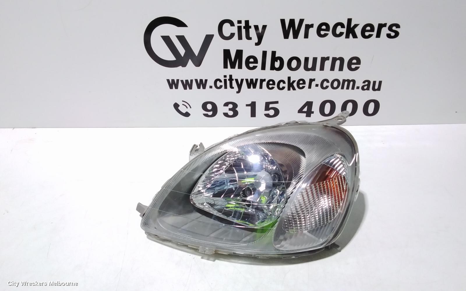 TOYOTA ECHO LEFT HEADLAMP, NCP10R, HATCH (GREY BASE), 10/1999 - 09/2002
