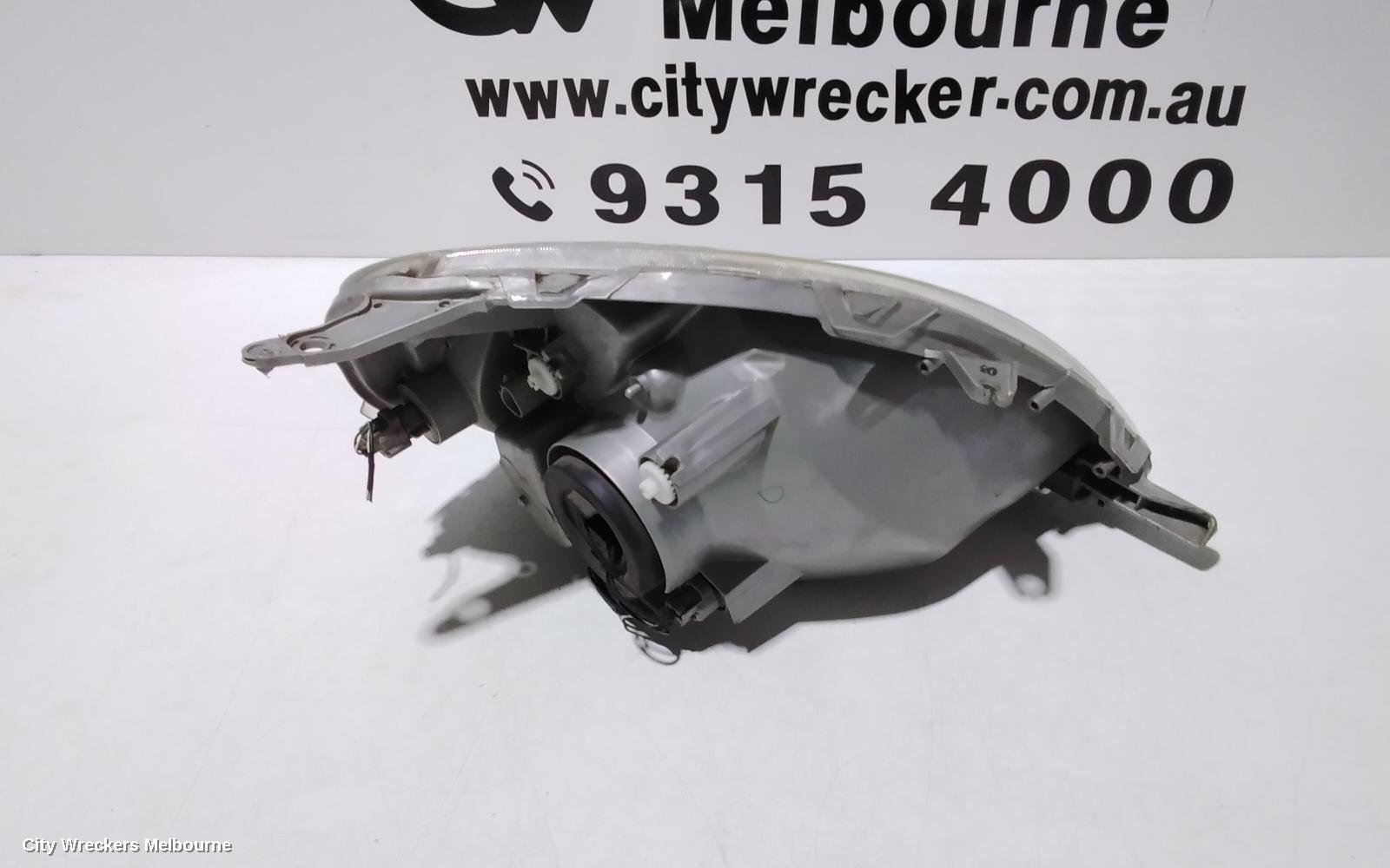 TOYOTA ECHO LEFT HEADLAMP, NCP10R, HATCH (GREY BASE), 10/1999 - 09/2002