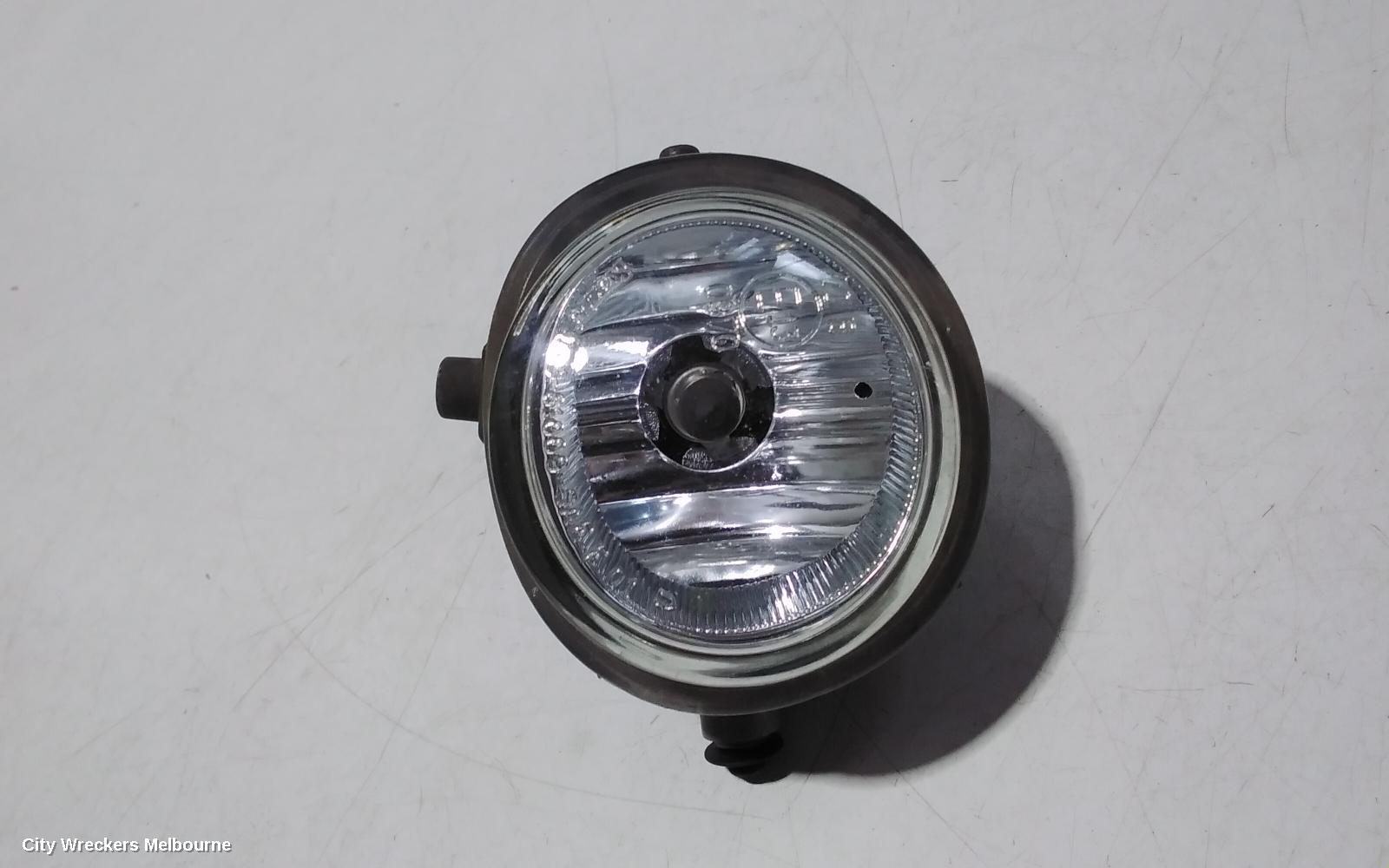 MAZDA 3 RIGHT INDICATOR/FOG/SIDE, BUMPER FOGLAMP, BK, ROUND TYPE, LENS# 114-61009, 10/2003 - 04/2009