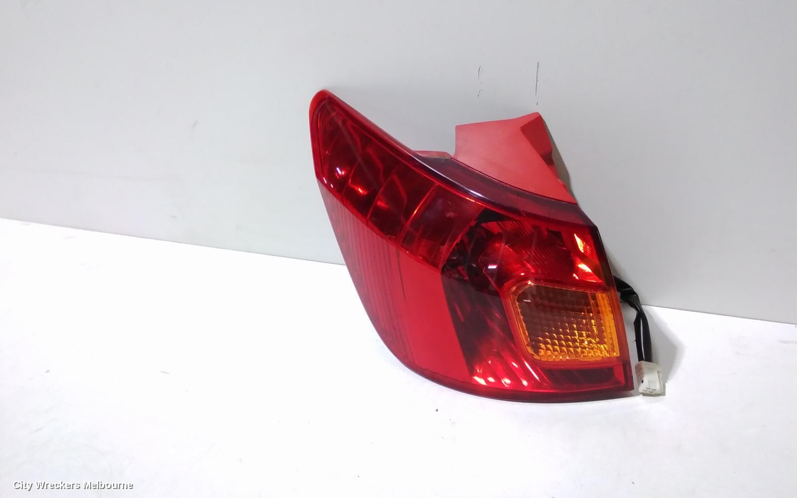TOYOTA CALDINA LEFT TAILLIGHT, T240, RED TYPE, LENS# 21-57, 02-04 (IMPORT)