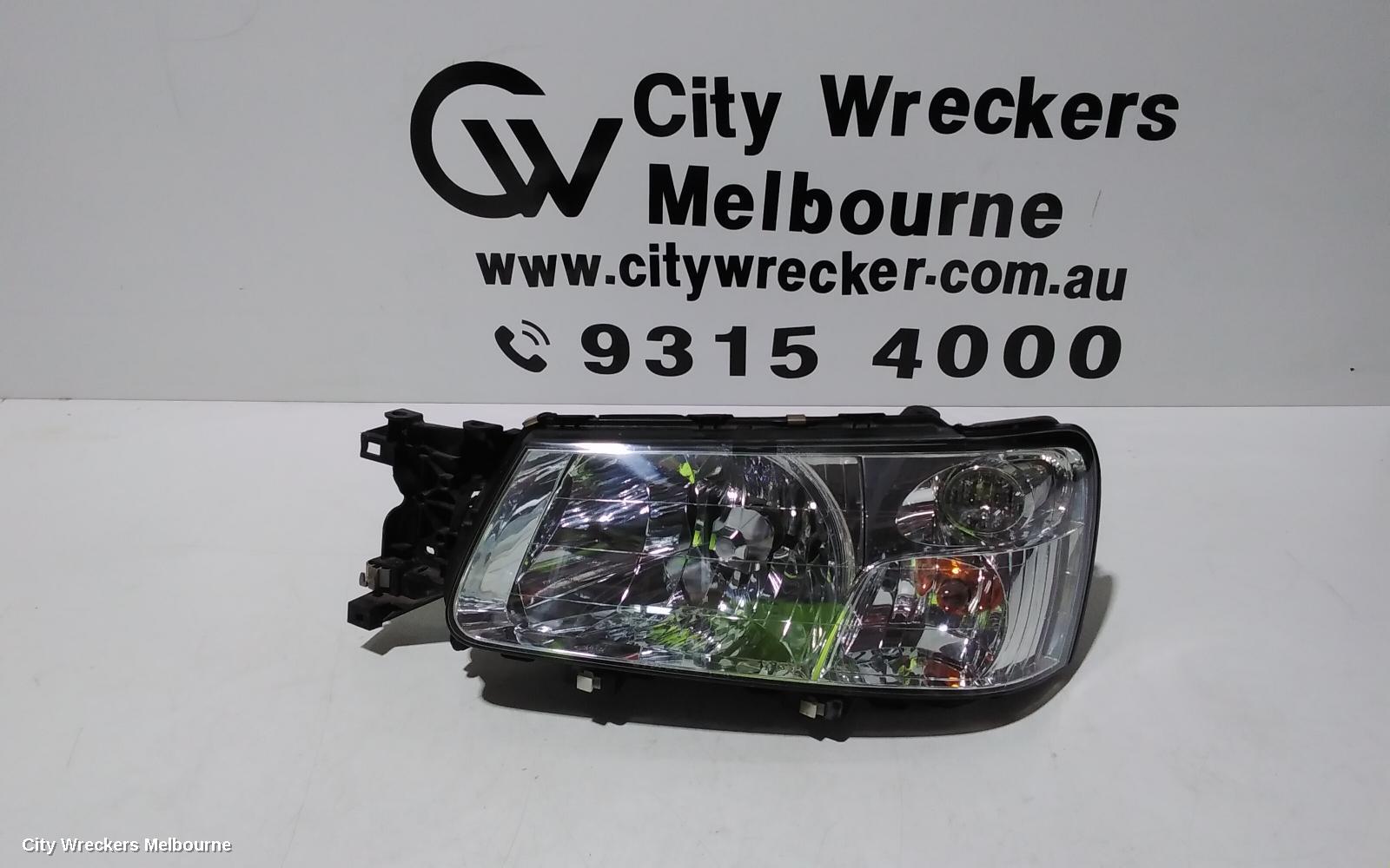 SUBARU FORESTER LEFT HEADLAMP, CHROME INSERT, LENS# 1703, 07/2002 - 07/2003