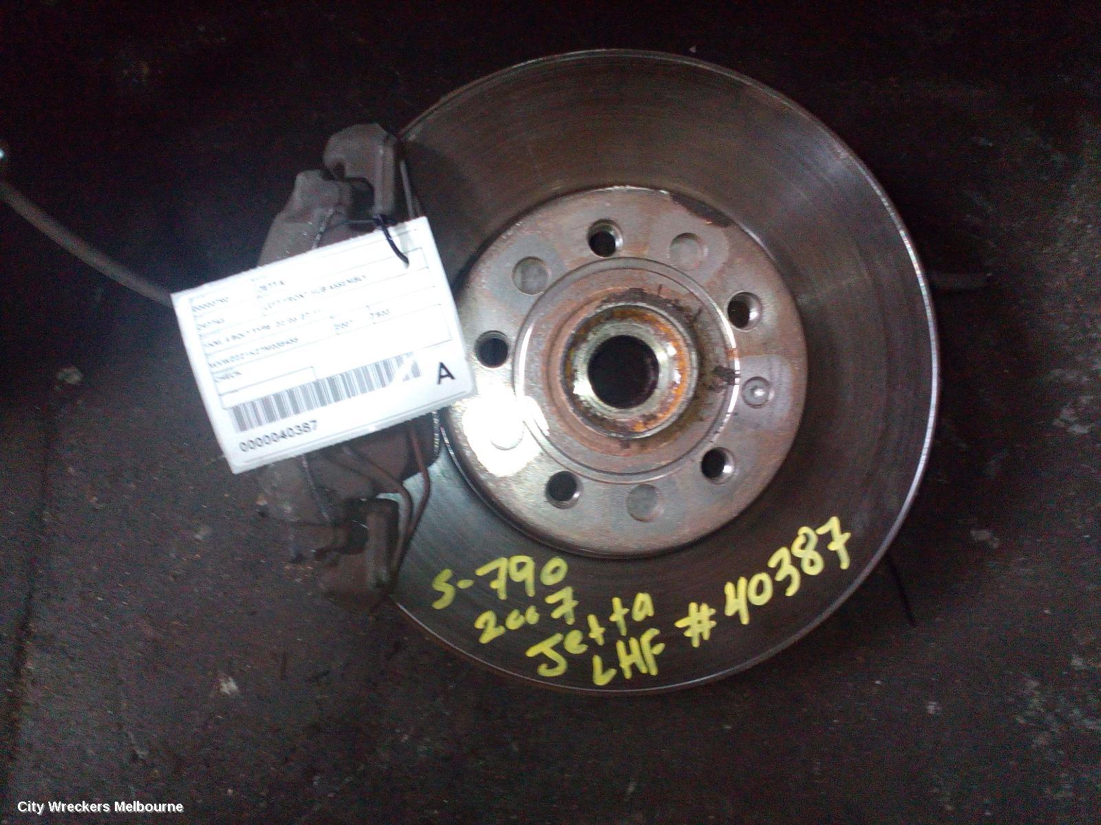 VOLKSWAGEN JETTA LEFT FRONT HUB ASSEMBLY, 1KM, 4 BOLT TYPE, 02/2006 - 07/2011