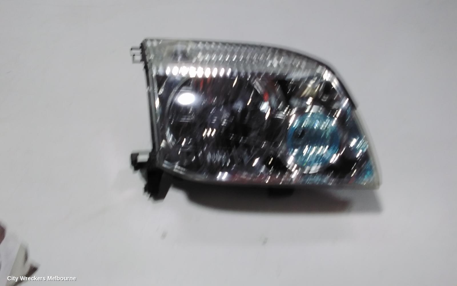 NISSAN XTRAIL RIGHT HEADLAMP, T30, BLUE LENS TYPE, 10/2001 - 09/2007