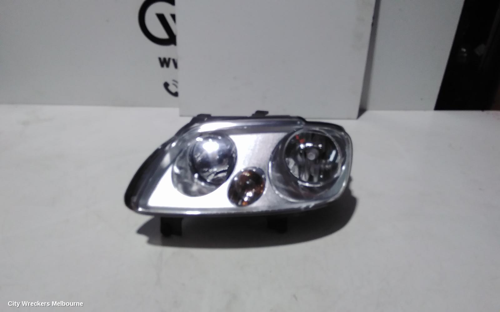 VOLKSWAGEN CADDY LEFT HEADLAMP, 2K, CHROME INSERT TYPE, 12/2004 - 08/2010