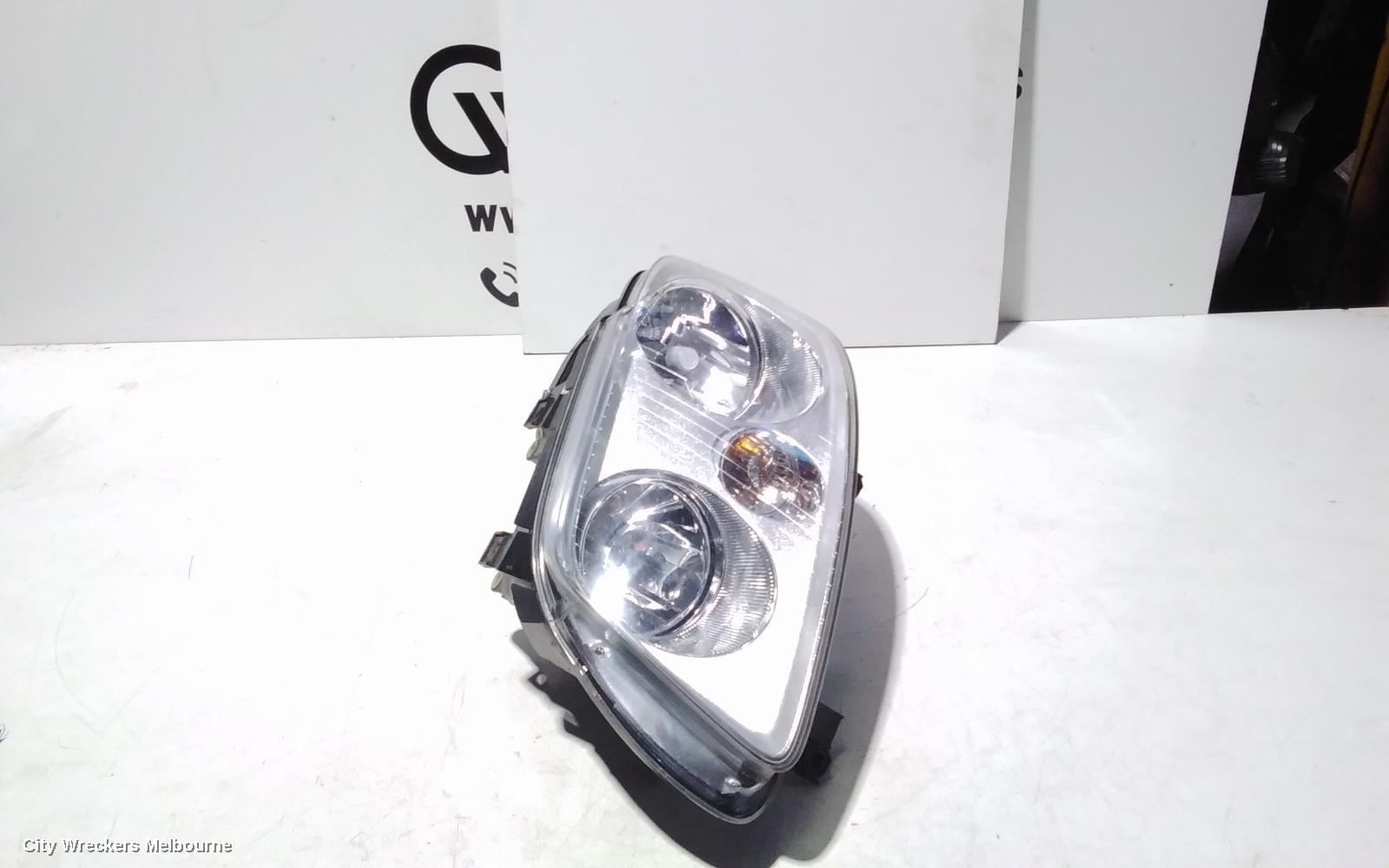 VOLKSWAGEN CADDY LEFT HEADLAMP, 2K, CHROME INSERT TYPE, 12/2004 - 08/2010