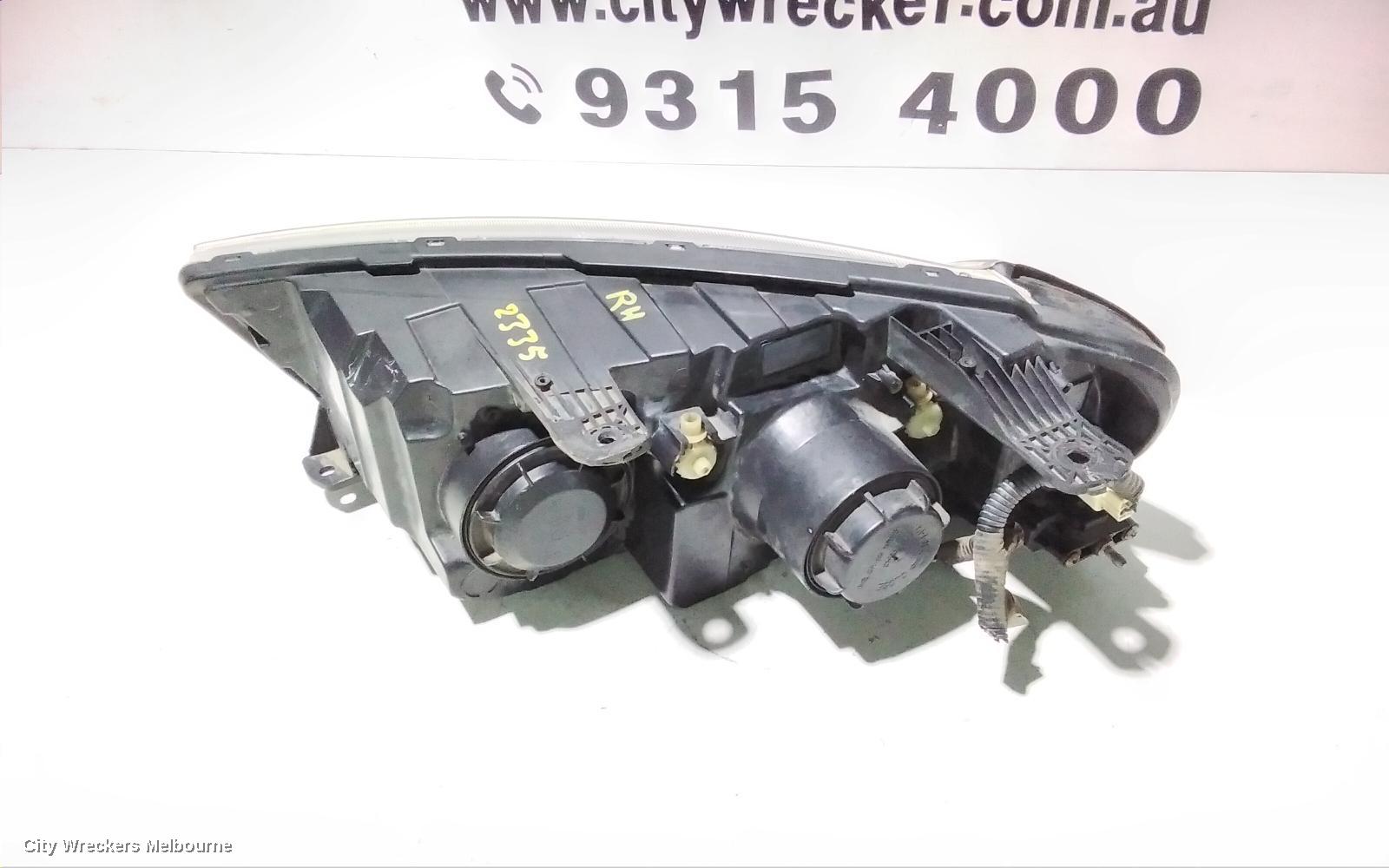 HOLDEN CAPTIVA RIGHT HEADLAMP, CG, CAPTIVA 7 (4TH VIN = C), BLACK SURROUND, 01/2011 - 09/2015