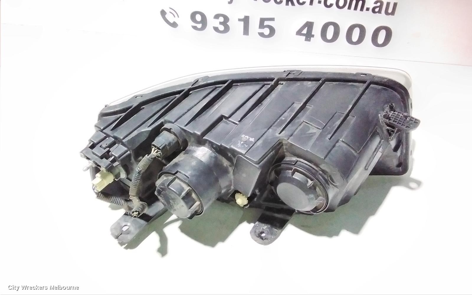 HOLDEN CAPTIVA RIGHT HEADLAMP, CG, CAPTIVA 7 (4TH VIN = C), BLACK SURROUND, 01/2011 - 09/2015