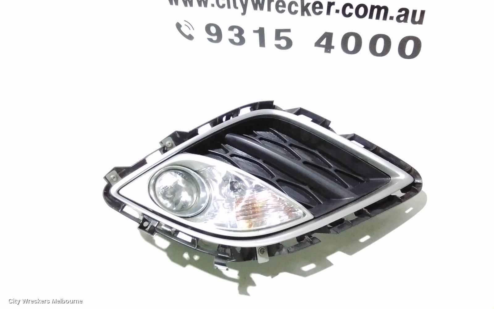 MAZDA CX7 LEFT INDICATOR/FOG/SIDE, BUMPER FOGLAMP, ER, 06/2009 - 02/2012