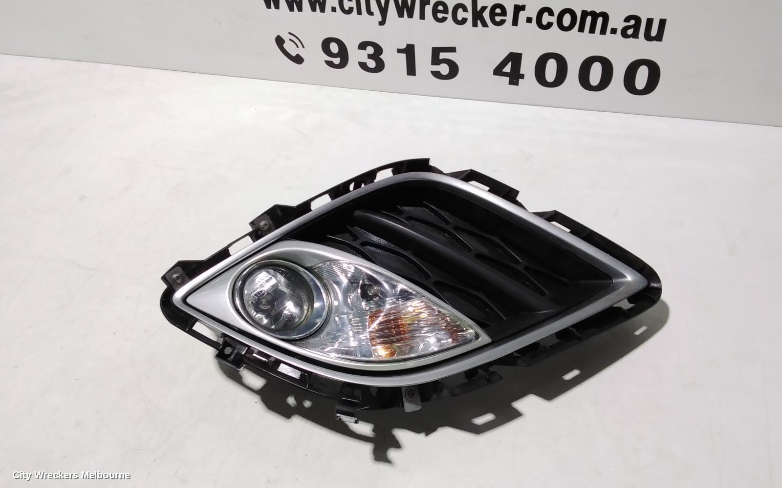 MAZDA CX7 LEFT INDICATOR/FOG/SIDE, BUMPER FOGLAMP, ER, 06/2009 - 02/2012