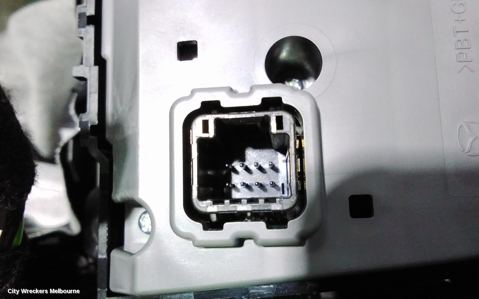 MAZDA CX3, MULTIMEDIA HUB SWITCH (CENTRE CONSOLE), W/ ELECTRIC HANDBRAKE TYPE, DK, 03/2015 ONWARDS, WITH GEAR SUROUND: 106827