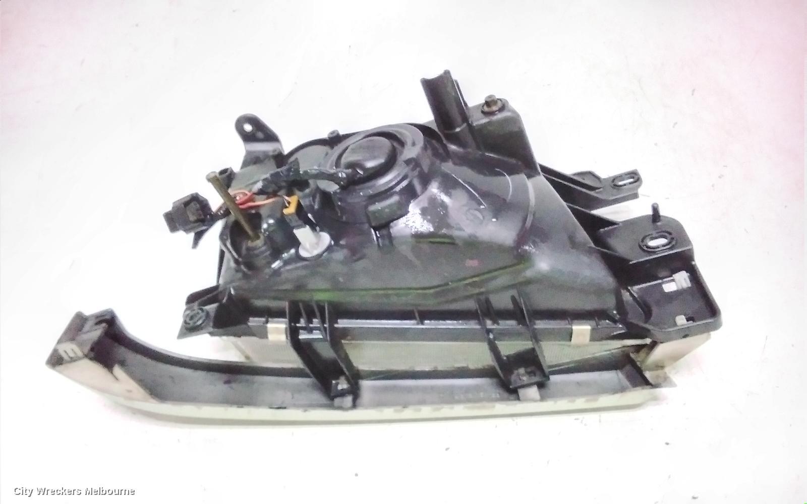 SUBARU FORESTER LEFT HEADLAMP, LENS ICHIKOH 1550, VIN JF2SF5..., 08/1997 - 01/2000