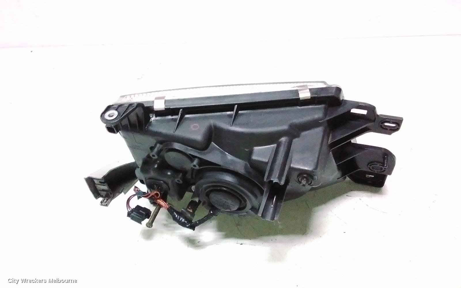 SUBARU FORESTER LEFT HEADLAMP, LENS ICHIKOH 1550, VIN JF2SF5..., 08/1997 - 01/2000