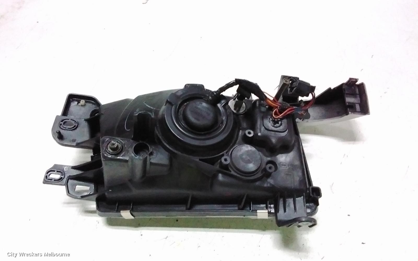 SUBARU FORESTER LEFT HEADLAMP, LENS ICHIKOH 1550, VIN JF2SF5..., 08/1997 - 01/2000