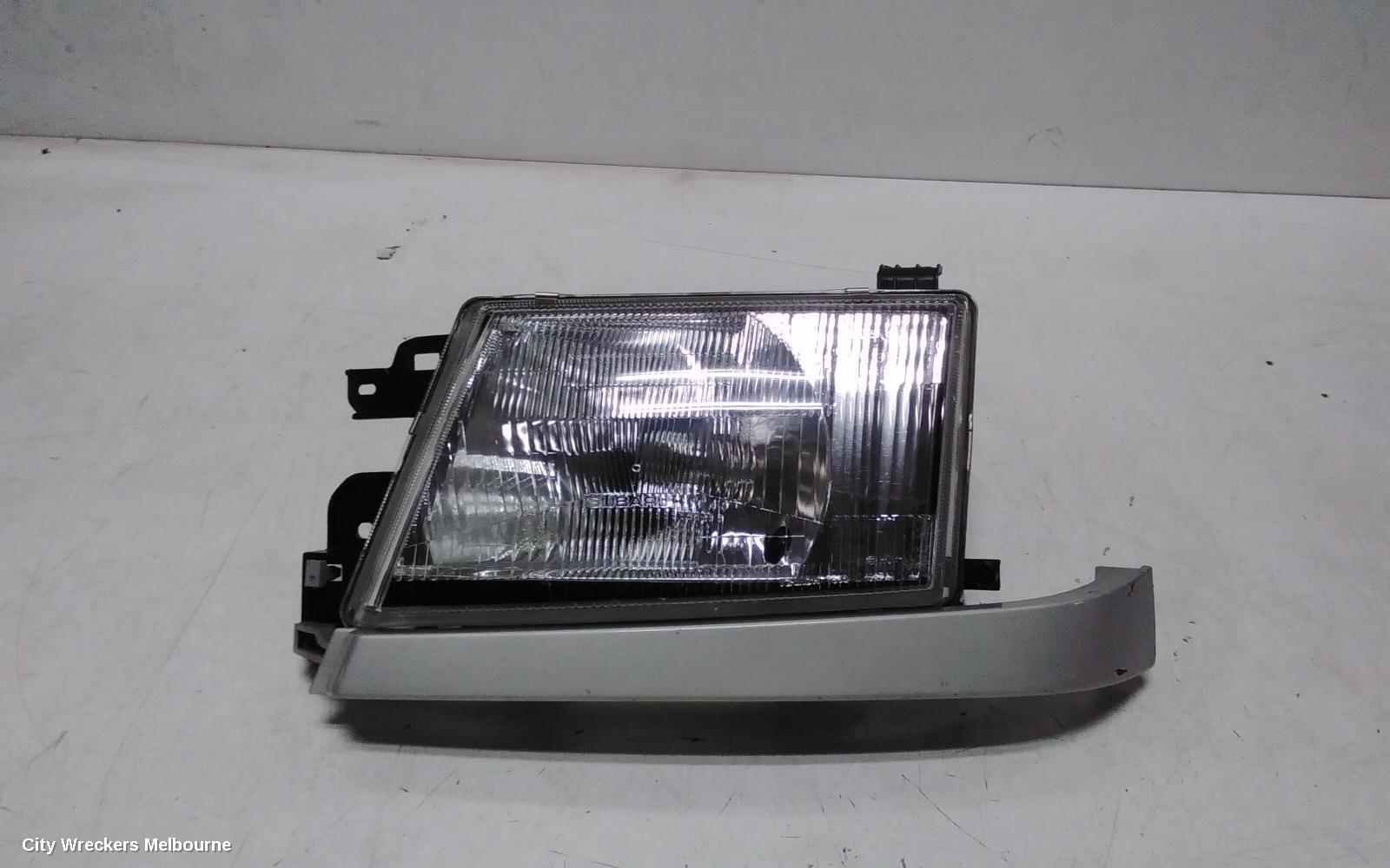 SUBARU FORESTER LEFT HEADLAMP, LENS ICHIKOH 1550, VIN JF2SF5..., 08/1997 - 01/2000