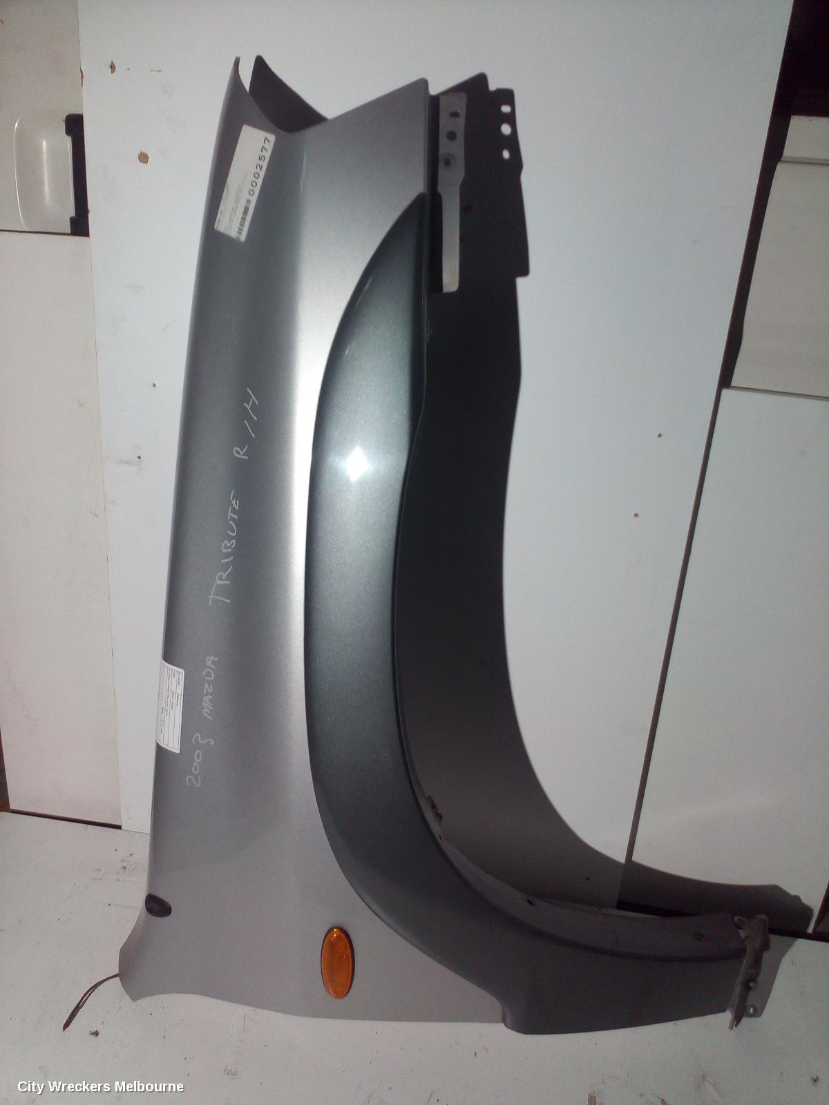 MAZDA TRIBUTE RIGHT GUARD, YU SERIES, FLARED TYPE, 02/2001 - 06/2006