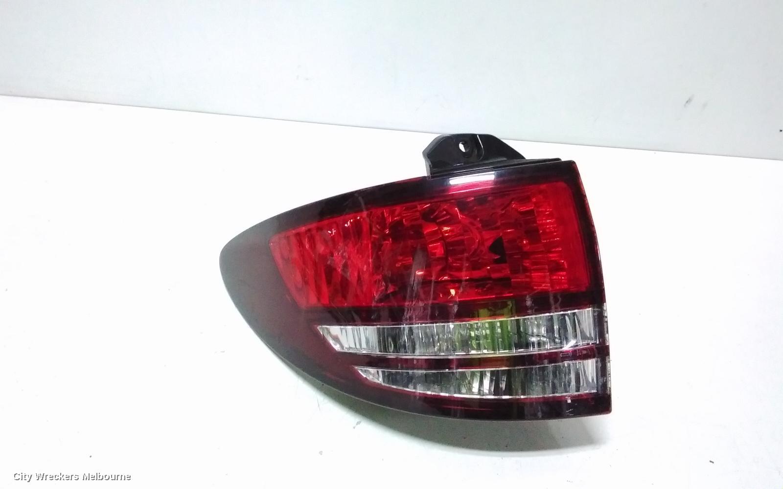 TOYOTA ESTIMA LEFT TAILLIGHT, XR30/XR40, RED/CLEAR, LENS# 28-169, 03-06 (IMPORT)