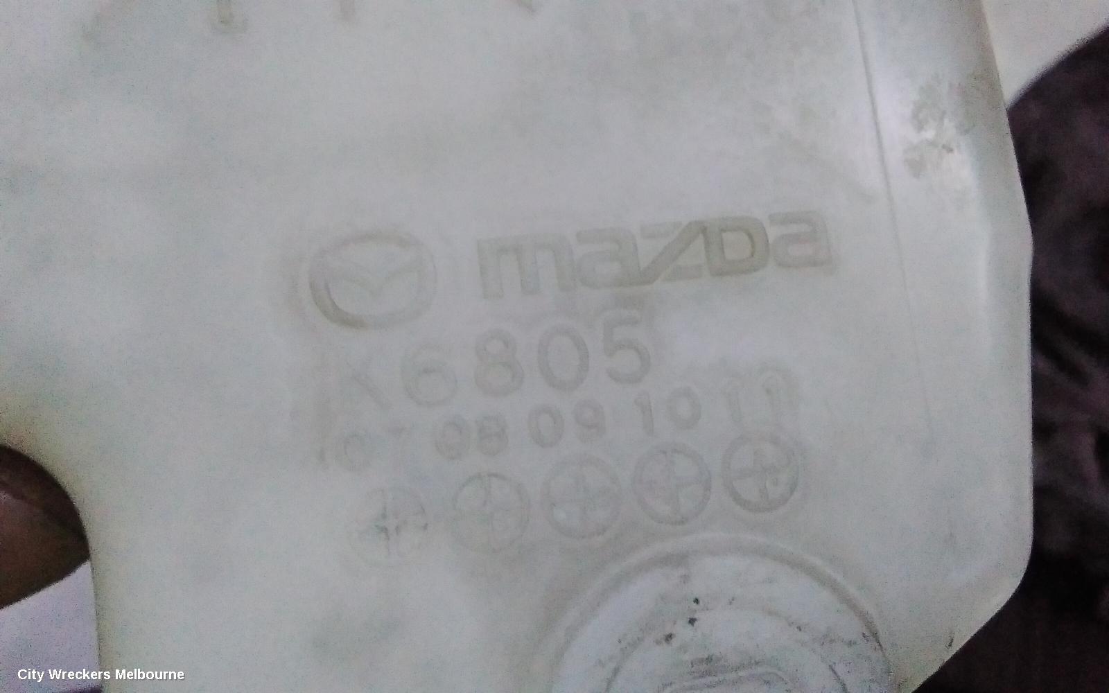 MAZDA 2 OVERFLOW BOTTLE, DE SERIES, 09/2007 - 09/2014