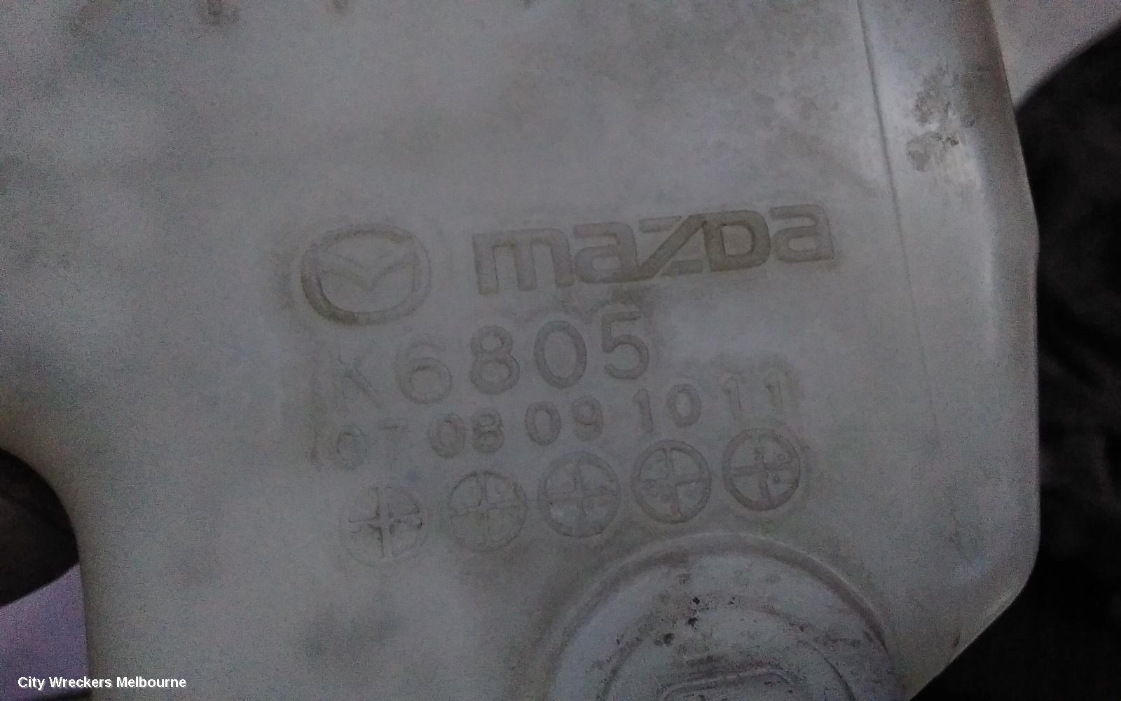MAZDA 2 OVERFLOW BOTTLE, DE SERIES, 09/2007 - 09/2014