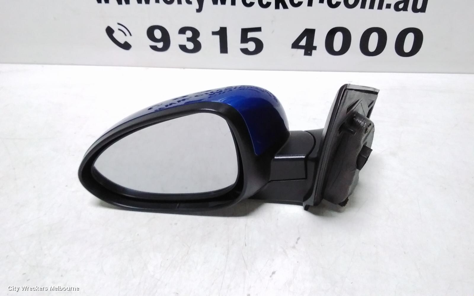 HOLDEN BARINA LEFT DOOR MIRROR, TM, COLOUR CODED, 09/2011 - 12/2018