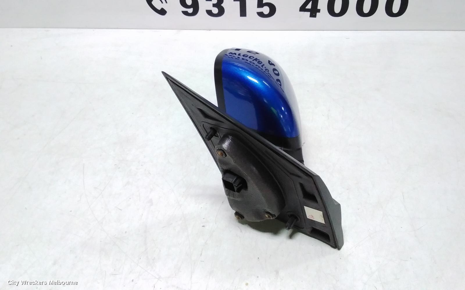 HOLDEN BARINA LEFT DOOR MIRROR, TM, COLOUR CODED, 09/2011 - 12/2018
