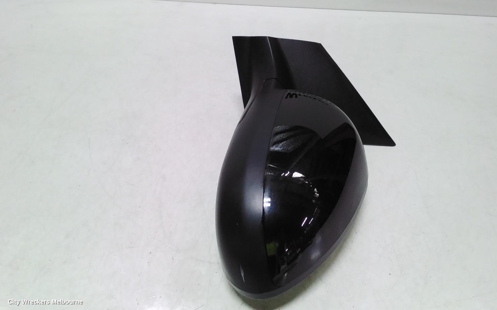 HOLDEN BARINA LEFT DOOR MIRROR, TM, COLOUR CODED, 09/2011 - 12/2018