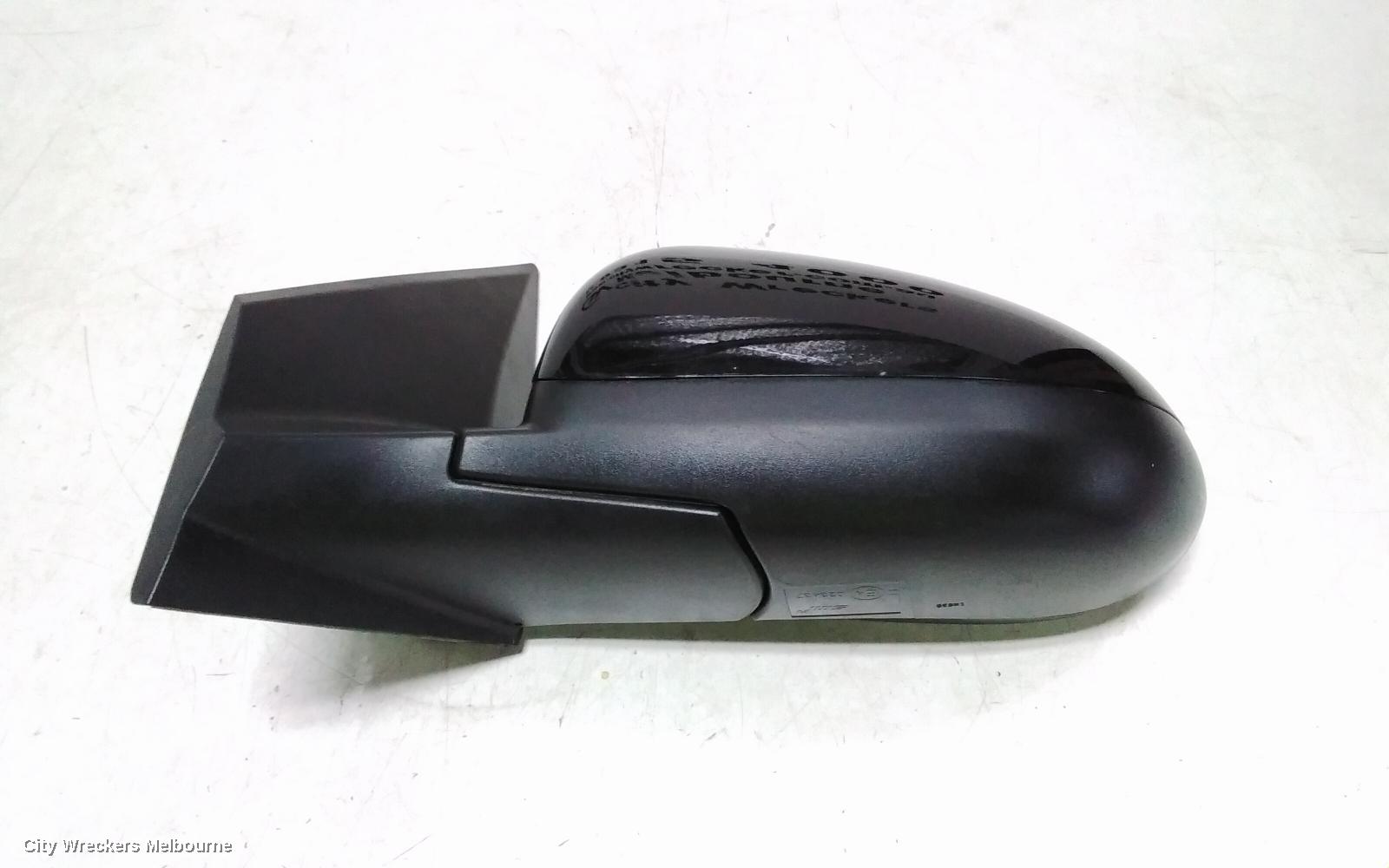 HOLDEN BARINA LEFT DOOR MIRROR, TM, COLOUR CODED, 09/2011 - 12/2018