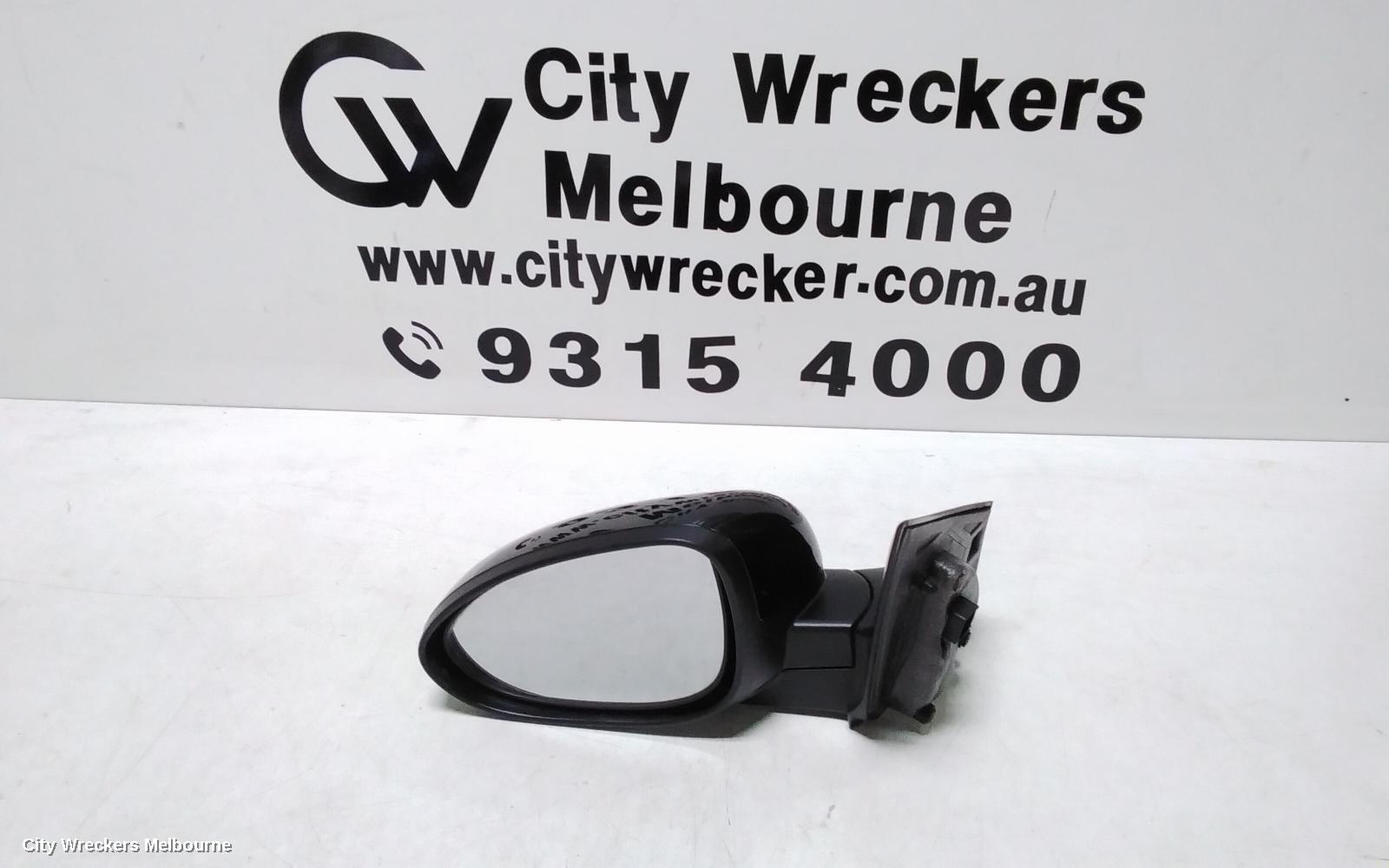 HOLDEN BARINA LEFT DOOR MIRROR, TM, COLOUR CODED, 09/2011 - 12/2018