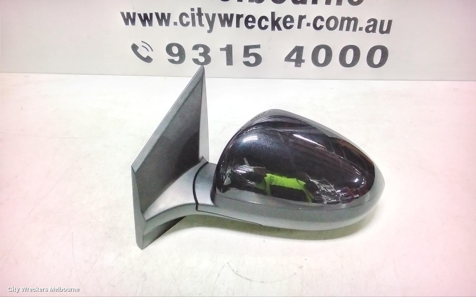 HOLDEN BARINA LEFT DOOR MIRROR, TM, COLOUR CODED, 09/2011 - 12/2018