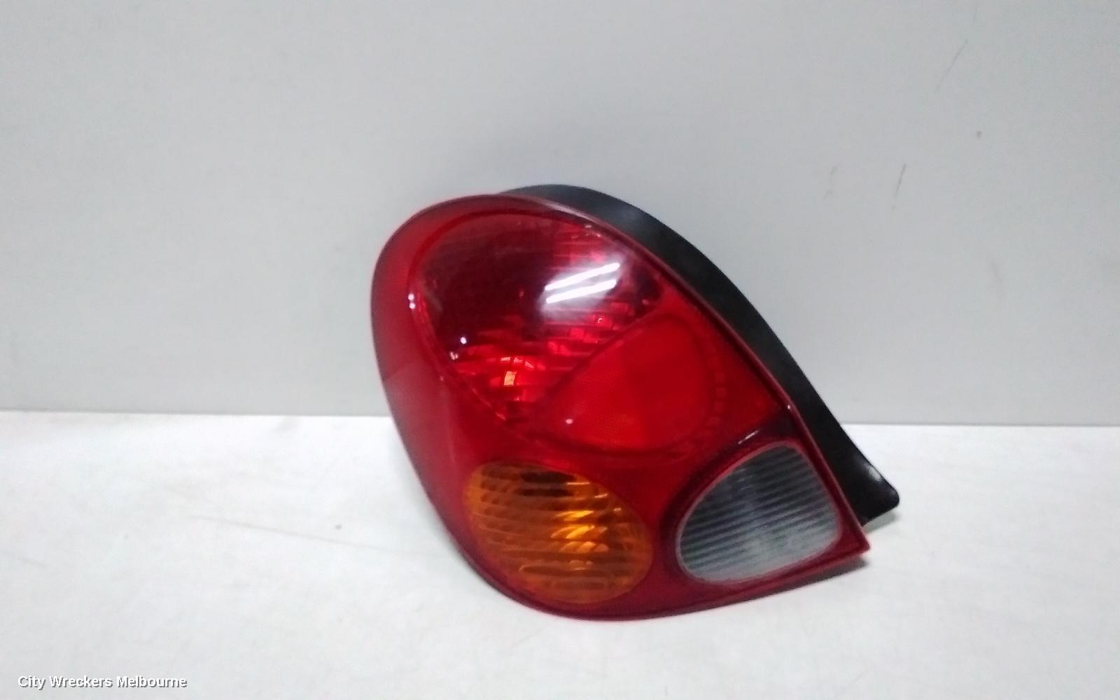 TOYOTA COROLLA LEFT TAILLIGHT, AE112, SECA, KOITO 12-441, 10/1999 - 11/2001
