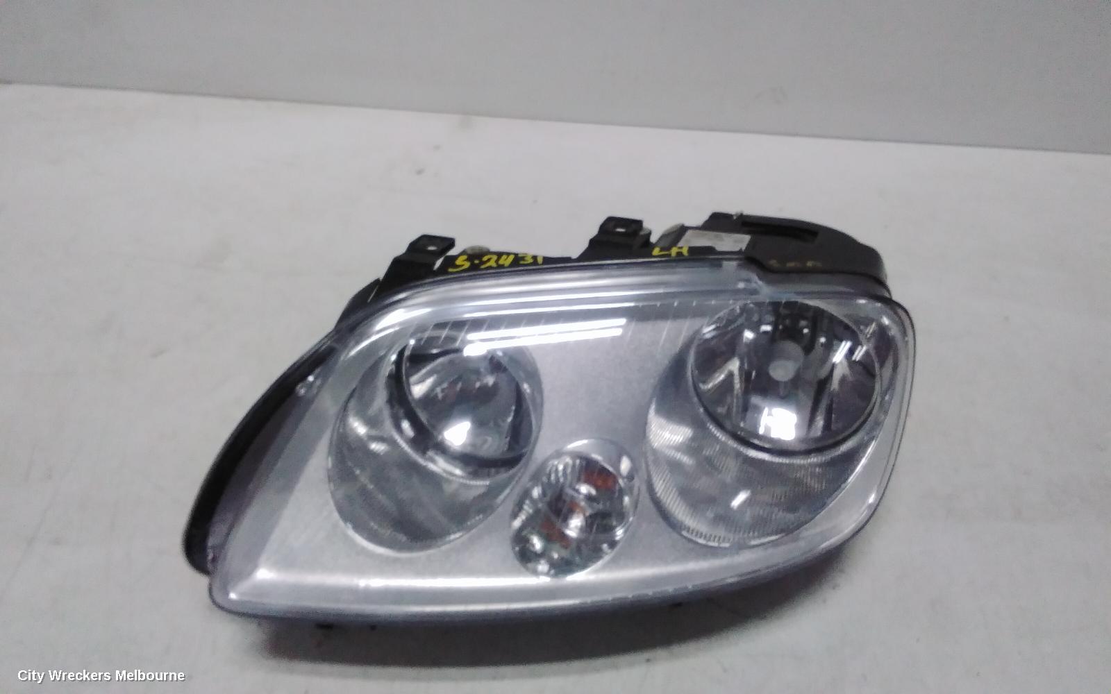 VOLKSWAGEN CADDY LEFT HEADLAMP, 2K, CHROME INSERT TYPE, 12/2004 - 08/2010