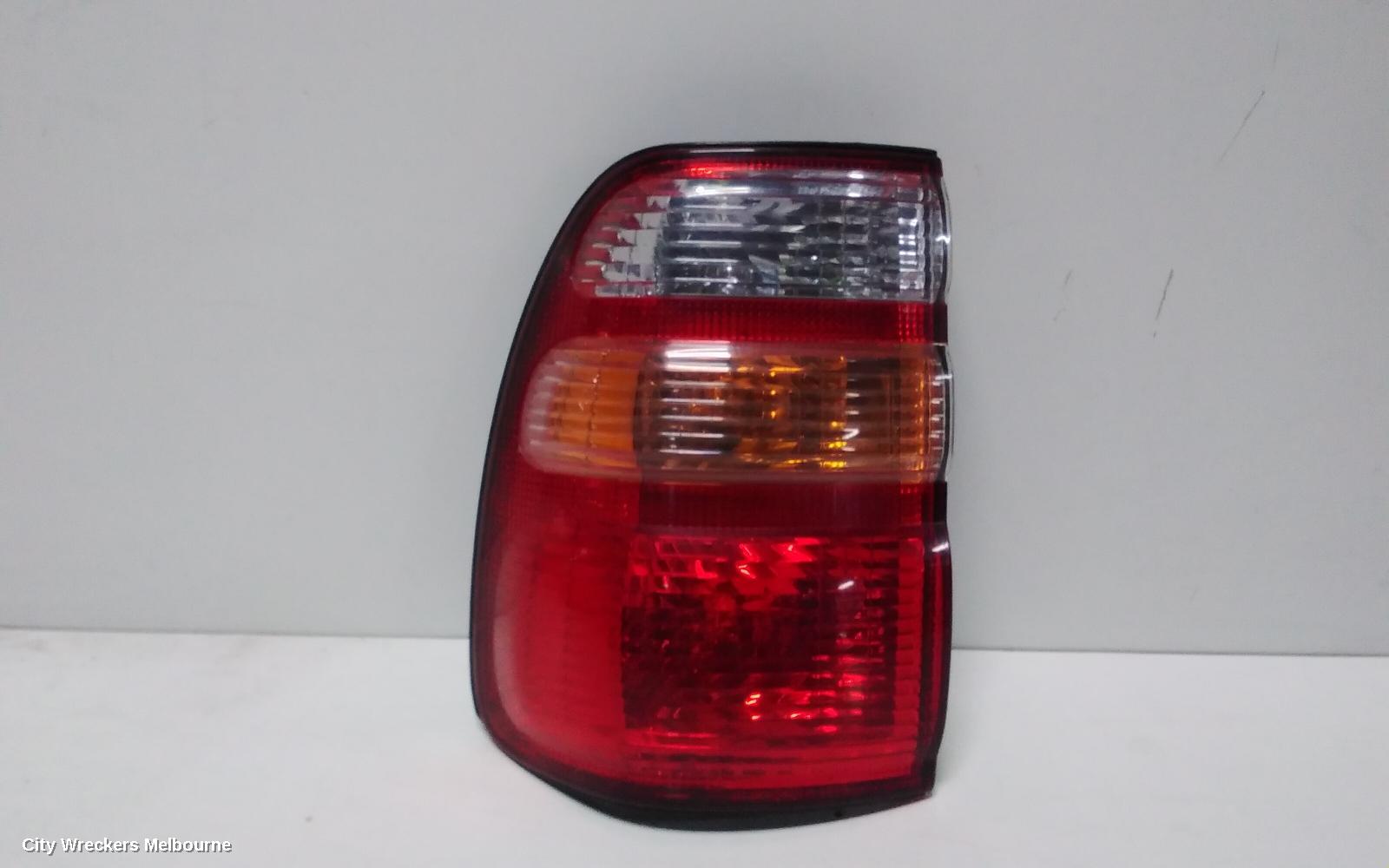 TOYOTA LANDCRUISER LEFT TAILLIGHT, 100 SERIES, KOITO LENS# 60-70, 01/1998 - 10/2002