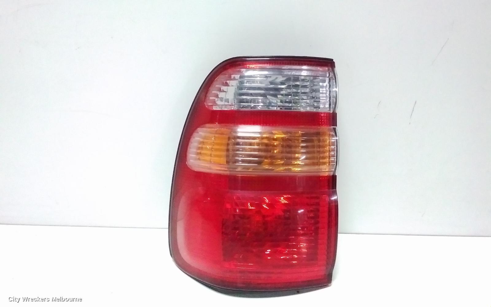 TOYOTA LANDCRUISER LEFT TAILLIGHT, 100 SERIES, KOITO LENS# 60-70, 01/1998 - 10/2002