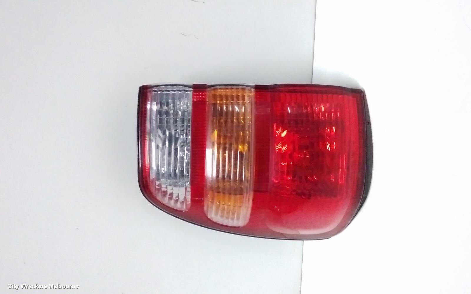 TOYOTA LANDCRUISER LEFT TAILLIGHT, 100 SERIES, KOITO LENS# 60-70, 01/1998 - 10/2002