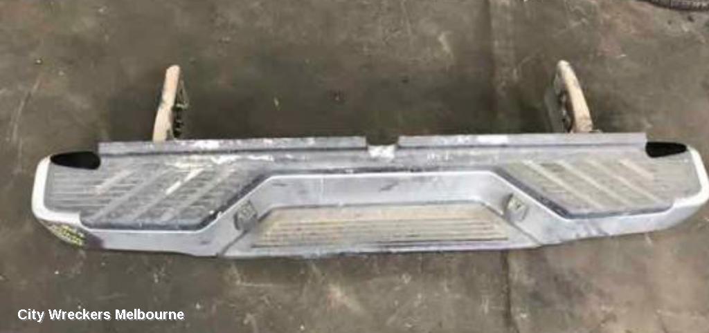 NISSAN NAVARA REAR BUMPER, D40 (VIN MNT), CHROME FACIA ONLY, 09/2005 - 08/2015