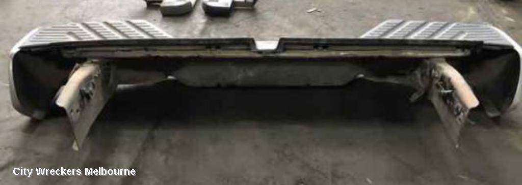 NISSAN NAVARA REAR BUMPER, D40 (VIN MNT), CHROME FACIA ONLY, 09/2005 - 08/2015