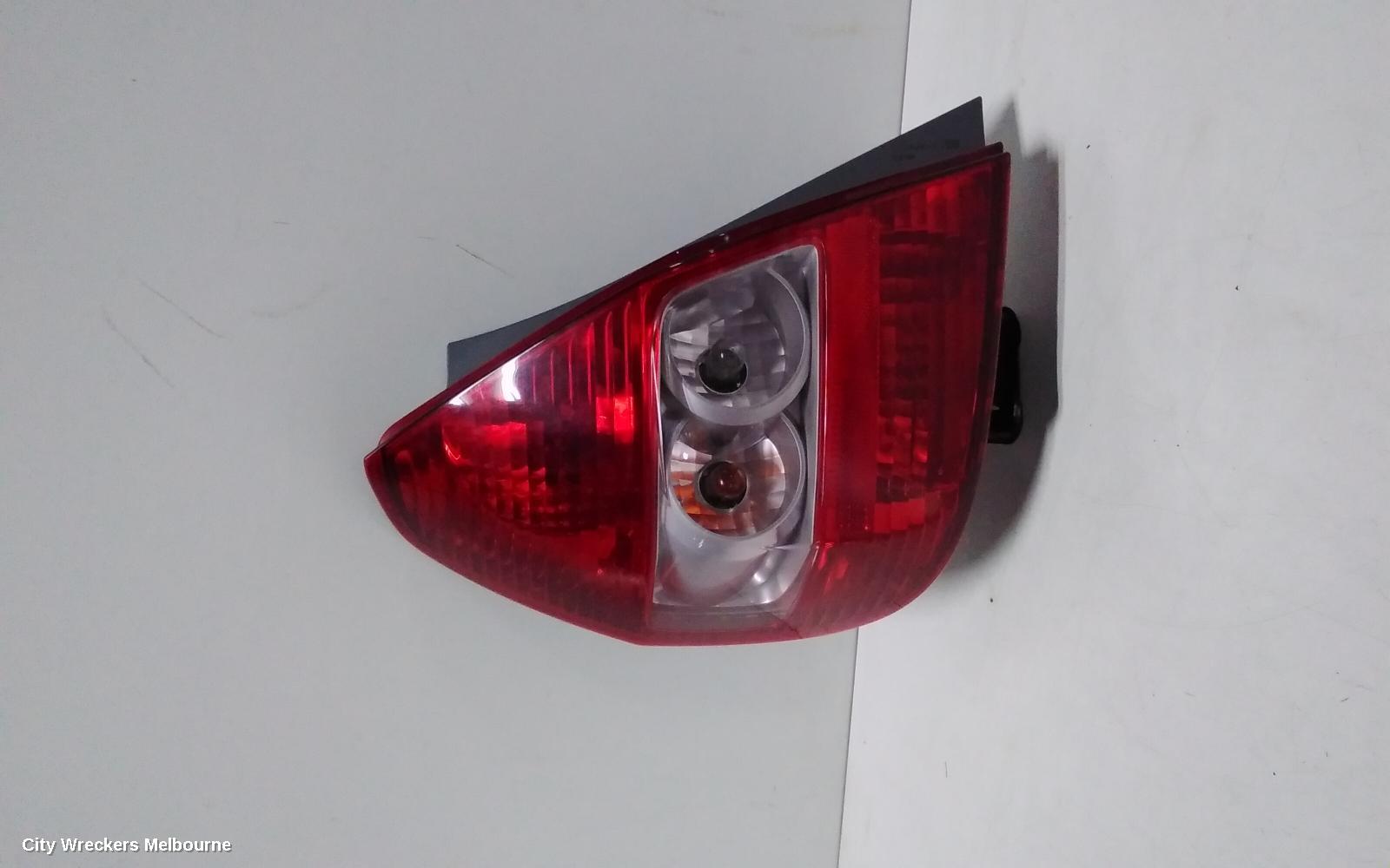 HONDA JAZZ LEFT TAILLIGHT, GD, GLI/VTI, ICHIKOH LENS# 4949, 10/2002 - 02/2006 (AUS ONLY)