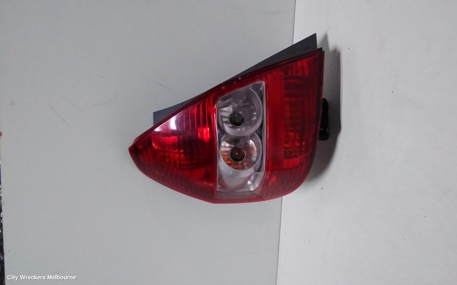 HONDA JAZZ LEFT TAILLIGHT, GD, GLI/VTI, ICHIKOH LENS# 4949, 10/2002 - 02/2006 (AUS ONLY)