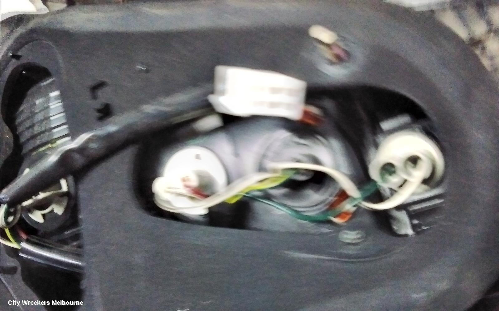 TOYOTA CAMRY LEFT TAILLIGHT, SK36, REVERSE LAMP IN CENTRE, 08/2002 - 09/2004