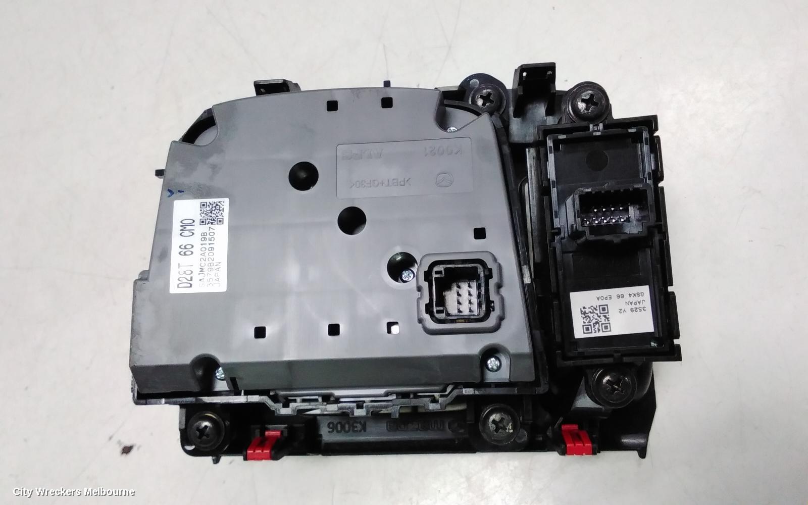 MAZDA CX3, MULTIMEDIA HUB SWITCH (CENTRE CONSOLE), W/ ELECTRIC HANDBRAKE TYPE, DK, 03/2015 ONWARDS