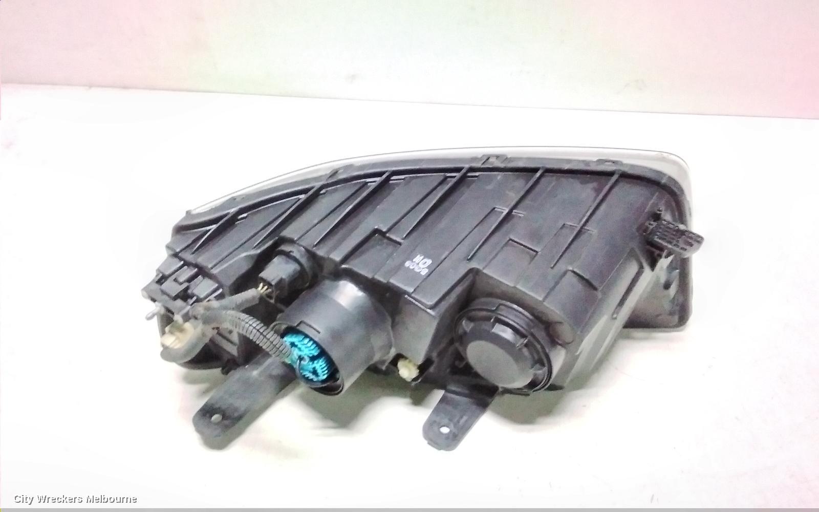 HOLDEN CAPTIVA RIGHT HEADLAMP, CG, CAPTIVA 7 (4TH VIN = C), BLACK SURROUND, 01/2011 - 09/2015