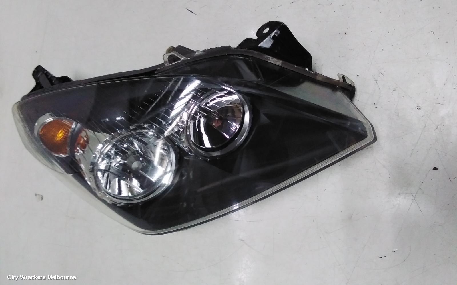 HOLDEN ASTRA RIGHT HEADLAMP, AH, BLACK INSERT TYPE, 10/2004 - 08/2009