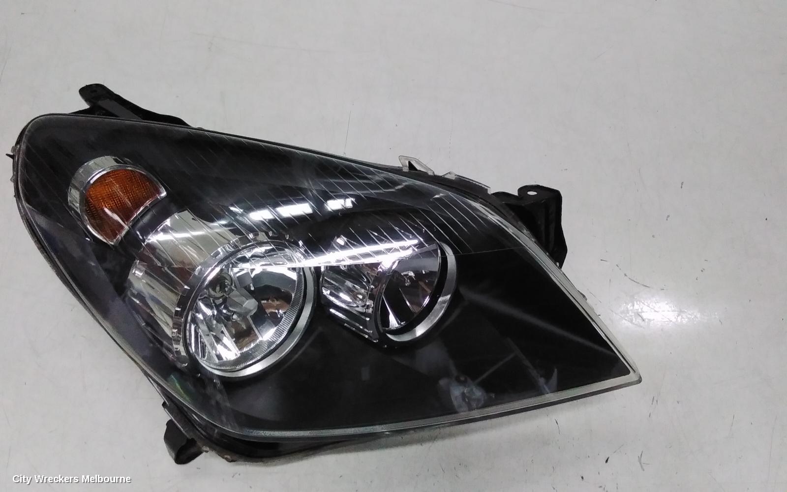 HOLDEN ASTRA RIGHT HEADLAMP, AH, BLACK INSERT TYPE, 10/2004 - 08/2009