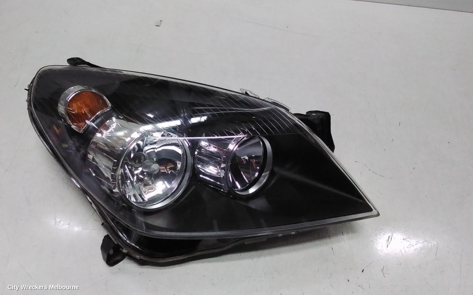 HOLDEN ASTRA RIGHT HEADLAMP, AH, BLACK INSERT TYPE, 10/2004 - 08/2009