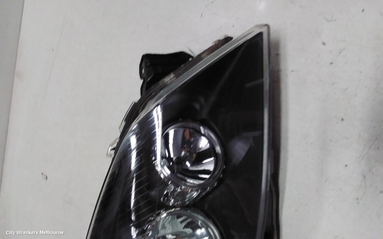 HOLDEN ASTRA RIGHT HEADLAMP, AH, BLACK INSERT TYPE, 10/2004 - 08/2009